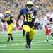 Michigan junior quarterback Denard Robinson runs the ball in for a touchdown during the second quarter at Michigan on Saturday. Melanie Maxwell I AnnArbor.com